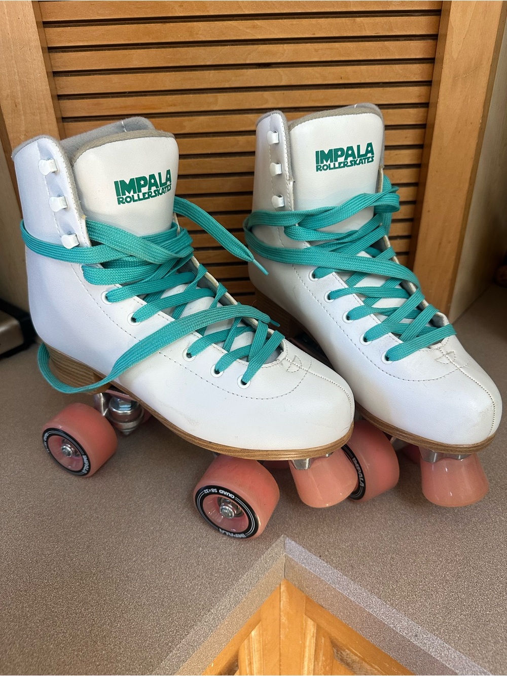 Impala White Roller Skates with Teal Laces and Pink Wheels